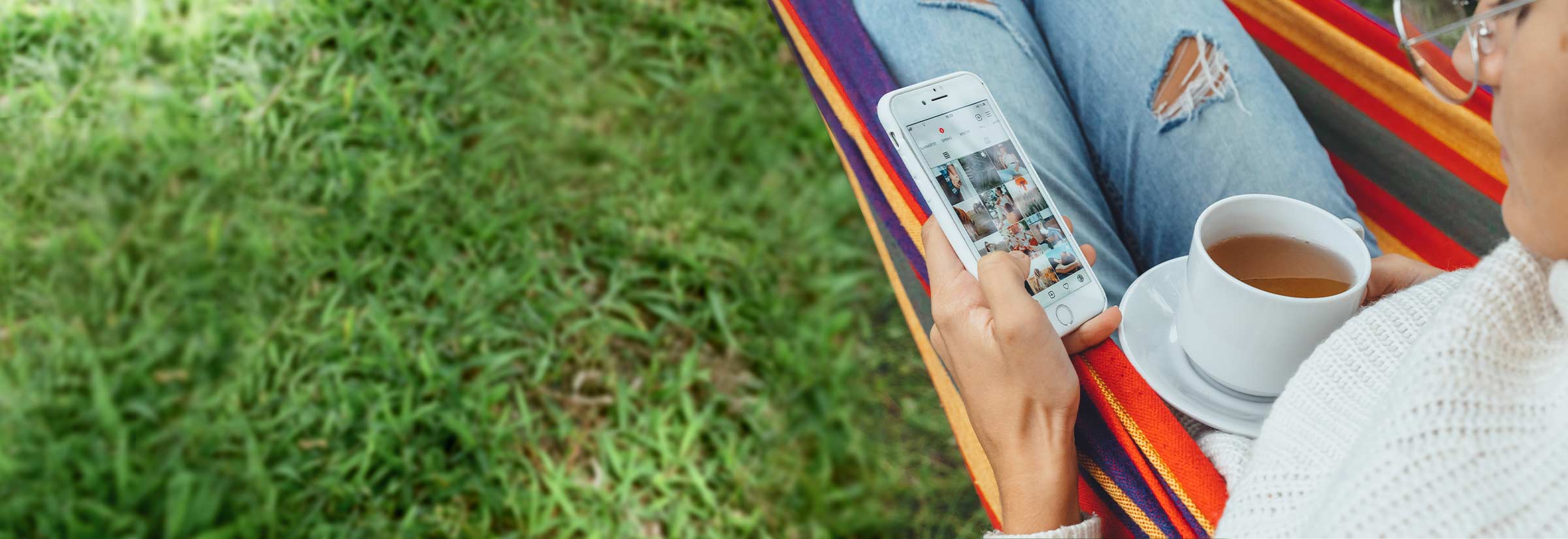 A person scrolling through Instagram on their phone.